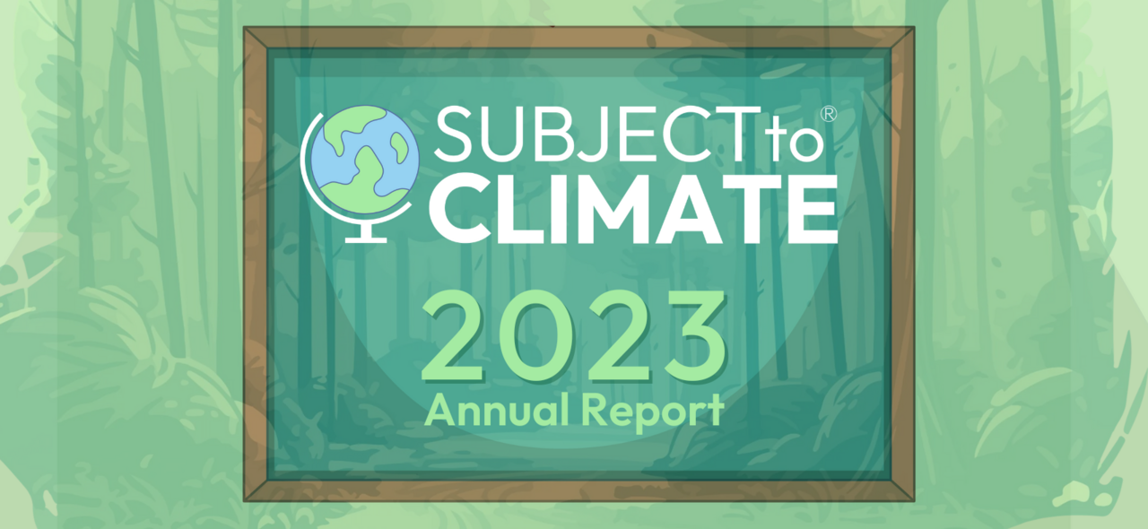 student looking through magnifying glass